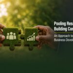 Image showing soil signifying growth with hands helping to build a community together through pooling financial resources.