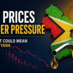 Oil prices on the decline. Image shows caption - Oil Prices under pressure, what it could mean for Guyana. Guyana Map is featured with a gas pump spout and oil drop with graph showing oil prices going down.