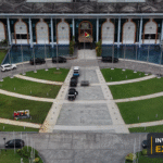 Aerial view of the Arthur Chung Conference Centre, with the Invest Guyana Explains masthead.