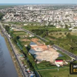 Drone view of Georgetown’s coastline, green spaces and urban area from Invest Guyana’s own footage.