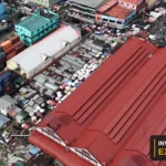 Drone view of the river, vessels and waterfront from Invest Guyana’s original footage.