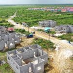 Drone view of young professional houses under construction at the Palmyra Housing Scheme in Region Six.