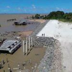 Construction work on the new Parika Ferry Stelling and waterfront project in Guyana.